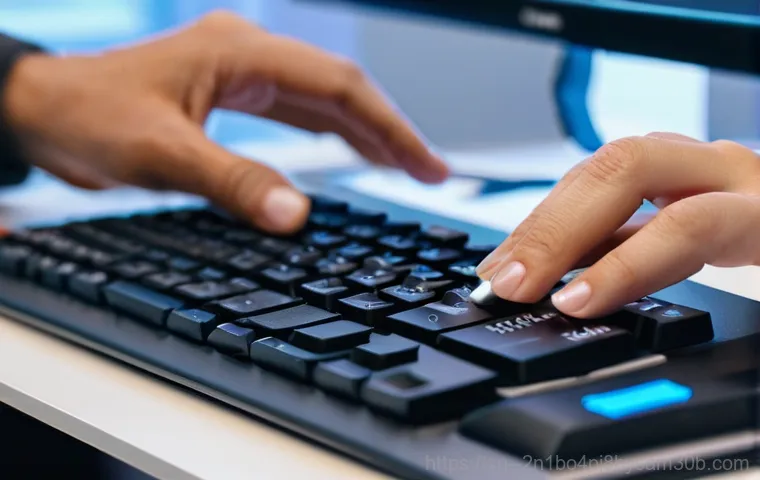 홍파동 컴퓨터멈춤 - A focused shot of a young professional, male or female, around 30 years old, sitting at a desk with ...