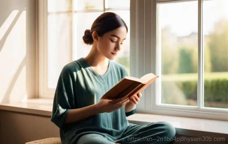 중화동 STATUS_MEMORY_OVERFLOW - A person in their early thirties, wearing a comfortable but smart sweater and jeans, sits at a moder...