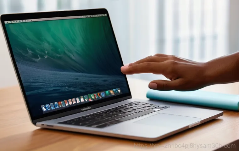 별양동 맥북프로 판매 및 수리 - A young person (mid-20s, gender-neutral, wearing casual everyday clothes) sitting at a minimalist wo...