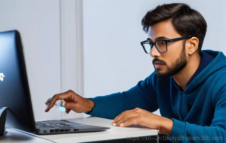 노고산동 NTFS_FILE_SYSTEM - A close-up of an adult office worker, looking distraught and frustrated, staring at a computer monit...