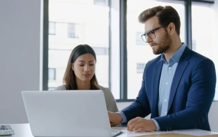 우면동 출장방문윈도우 windows 설치 - A close-up, dynamic shot of a modern, high-performance silver laptop displaying the vibrant and clea...