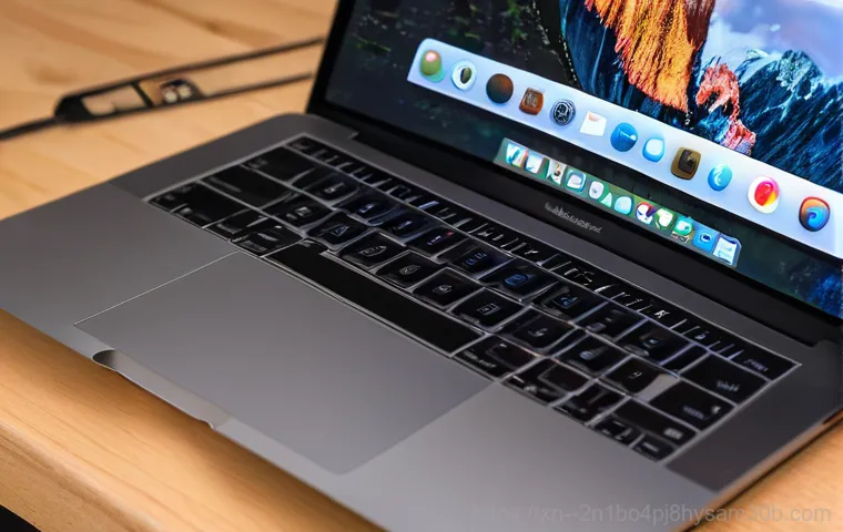 오포읍 맥북프로 판매 및 수리 - A close-up shot of a modern MacBook Pro (M1/M2 model) lying on a table, with one corner of its scree... 오포읍 맥북프로 판매 및 수리 - A close-up shot of a modern MacBook Pro (M1/M2 model) lying on a table, with one corner of its scree...