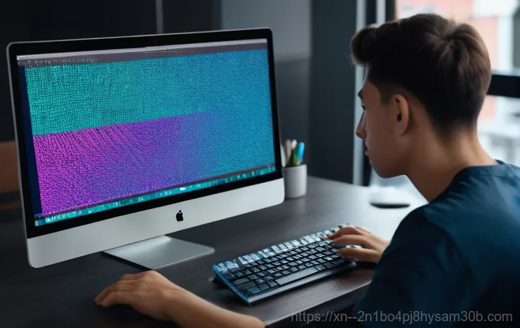 마곡동 DRIVER_CAUGHT_MODIFYING_FREED_POOL - A person, visibly frustrated and a bit exasperated, sits in front of a computer monitor displaying a...