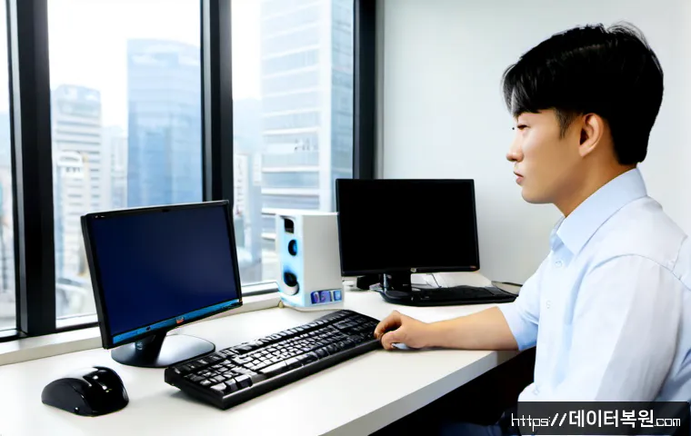 영등포동 블루스크린 - Photorealistic IT support workstation in Yeongdeungpo-dong, Seoul, dual monitors with a plain blue s...