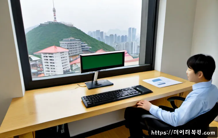 충신동 STATUS_DEVICE_NOT_READY - Photorealistic remote-support workstation in a compact Seoul hillside apartment office, desktop moni...