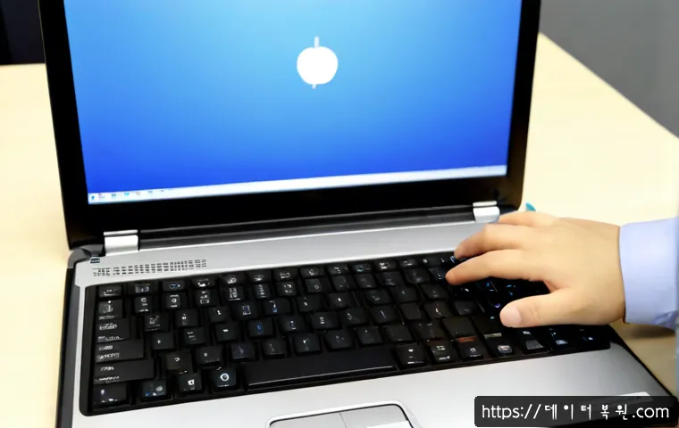 영등포구 맥윈도우 부트캠프_bootcamp 재설치 포맷  초기화 - Photorealistic IT workstation in Yeongdeungpo, Seoul, an unbranded silver laptop showing a clean ope...