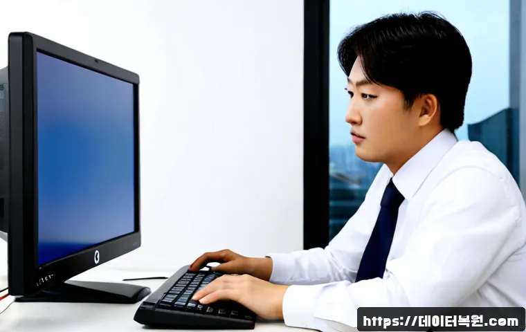 수하동 KMODE_EXCEPTION_NOT_HANDLED - Photorealistic IT support workstation in a compact Suhadong office, desktop monitor showing a blank ...