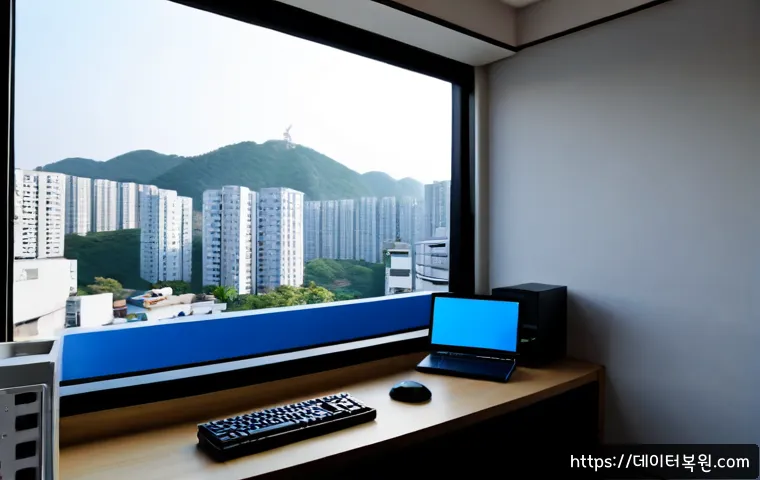 고덕동 pc에 문제가 발생하여 다시 시작해야 합니다 - Photorealistic Korean apartment home office in Godeok-dong, desktop computer showing a plain deep-bl...