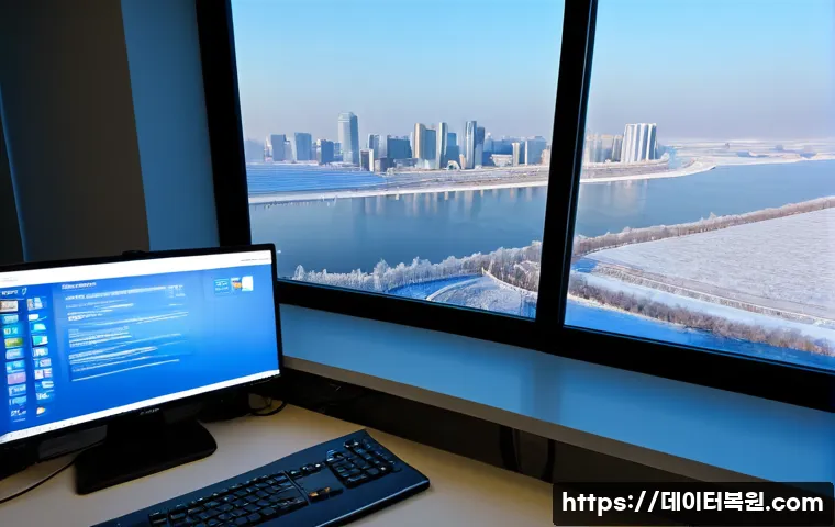 여의도 WIN32K_LOCK_HELD_TOO_LONG - Photorealistic Yeouido financial-district workstation, dual monitors frozen on a plain blue system e...
