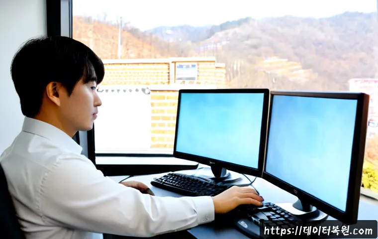 만리동 Press Ctrl Alt Del to restart - Photorealistic IT support workstation in Mangni-dong, Seoul, dual monitors showing a frozen abstract...