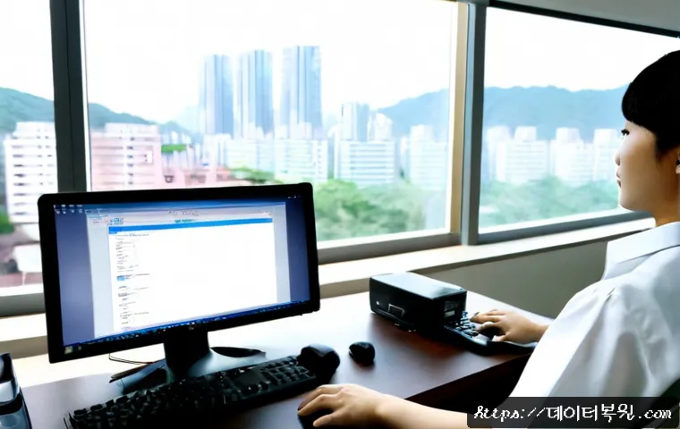 대장동 STATUS_FILE_READ_FAILURE - Photorealistic remote-support workstation in a modern suburban office, dual monitors showing a blank...